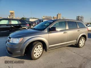 2013 Dodge Journey American Value with VIN 3C4PDCAB4DT695211, listed as a Copart auction lot 71990235 with 186,076 mi miles and Salvage title. Bid and sale history available at DreamBid. Image 1.