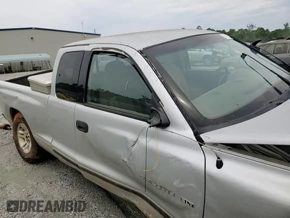 ✅ 2001 Dodge Dakota • VIN: 1B7GL22X01S173048 • Lot: 57018055. Wystawiony na Copart z przebiegiem 163 856 mil. Bezpłatny archiwum sprzedaży aukcyjnych z USA i szczegółowy raport historii pojazdu na DreamBid. Zdjęcie 14.