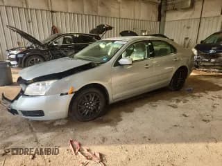 ✅ 2006 Mercury Milan • VIN: 3MEHM07Z76R653704 • Лот: 86867925. Опубликован ранее на Copart с пробегом 60 784 миль. Бесплатный доступ к архиву аукционных продаж из США и подробный отчёт об истории автомобиля на DreamBid. Изображение 1.