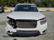 ✅ 2012 Hyundai Santa Fe SE • VIN: 5XYZH4AG4CG110518 • Lot: 77423244. Listed on Copart with 170,903 mi. Free auction sales archive from the USA and detailed vehicle history report at DreamBid. Image 5.