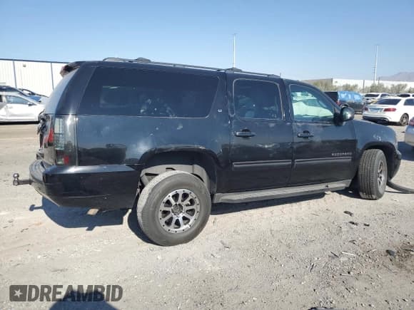 ✅ 2011 Chevrolet Suburban LT • VIN: 1GNSKJE3XBR385634 • Lot: 80205155. Listed on Copart with 182,201 mi. Free auction sales archive from the USA and detailed vehicle history report at DreamBid. Image 3.