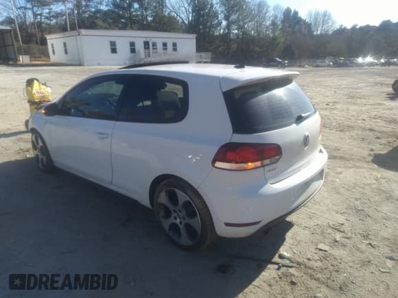 ✅ 2012 Volkswagen Golf GTI w/Conv & Sunroof • VIN: WVWEV7AJ5CW094384 • Lot: 41744860. Listed on IAAI with 157,285 mi. Free auction sales archive from the USA and detailed vehicle history report at DreamBid. Image 3.