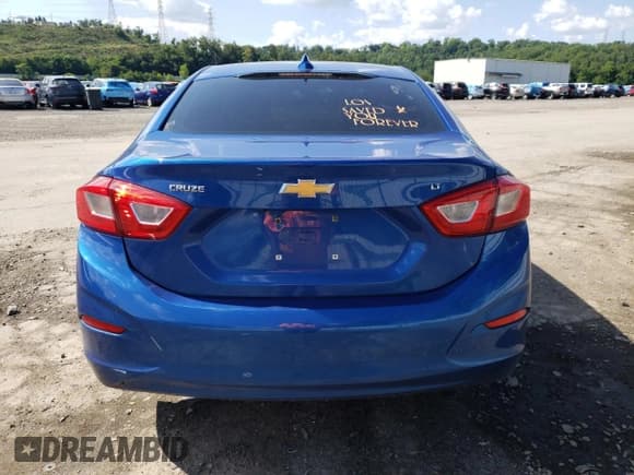 ✅ 2018 Chevrolet Cruze LT • VIN: 1G1BE5SM6J7191903 • Lot: 59162983. Listed on Copart with 79,639 mi. Free auction sales archive from the USA and detailed vehicle history report at DreamBid. Image 6.