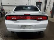 ✅ 2014 Dodge Charger RT Max • VIN: 2C3CDXDTXEH220803 • Lot: 42030345. Wystawiony na Copart z przebiegiem 134 815 mil. Bezpłatny archiwum sprzedaży aukcyjnych z USA i szczegółowy raport historii pojazdu na DreamBid. Zdjęcie 6.