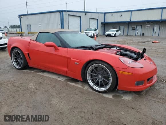 2013 Chevrolet Corvette 427 1SB with VIN 1G1YY3DE5D5702223, listed as a Copart auction lot 39260444 with 55,937 mi miles and Salvage title. Bid and sale history available at DreamBid. Image 4.