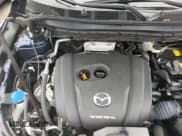 ✅ 2021 Mazda CX-5 Touring • VIN: JM3KFBCM3M1460908 • Лот: 93551875. Опубликован ранее на Copart с пробегом 41 120 миль. Бесплатный доступ к архиву аукционных продаж из США и подробный отчёт об истории автомобиля на DreamBid. Изображение 15.