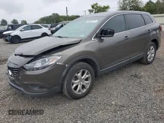 ✅ 2015 Mazda CX-9 Sport • VIN: JM3TB3BA8F0452048 • Lot: 80829175. Wystawiony na Copart z przebiegiem 173 253 mil. Bezpłatny archiwum sprzedaży aukcyjnych z USA i szczegółowy raport historii pojazdu na DreamBid. Zdjęcie 1.