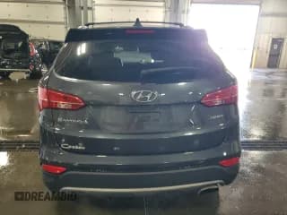 ✅ 2015 Hyundai Santa Fe • VIN: 5XYZU3LB0FG268981 • Лот: 90829105. Опубликован ранее на Copart с пробегом 102 988 миль. Бесплатный доступ к архиву аукционных продаж из США и подробный отчёт об истории автомобиля на DreamBid. Изображение 6.