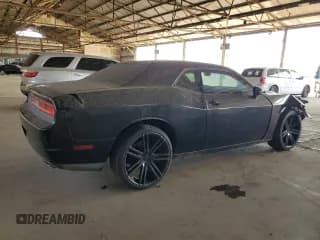 ✅ 2014 Dodge Challenger SXT • VIN: 2C3CDYAG1EH214742 • Lot: 64712454. Wystawiony na Copart z przebiegiem 144 067 mil. Bezpłatny archiwum sprzedaży aukcyjnych z USA i szczegółowy raport historii pojazdu na DreamBid. Zdjęcie 3.