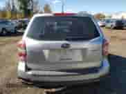 2015 Subaru Forester Premium with VIN JF2SJADC9FH477313, listed as a Copart auction lot 90075575 with 56,073 mi miles and Salvage title. Bid and sale history available at DreamBid. Image 6.