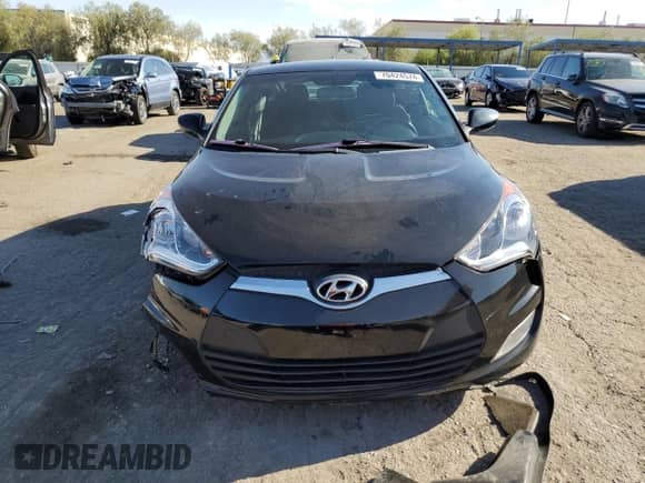 2017 Hyundai Veloster с VIN KMHTC6AD6HU316057, выставлен на аукционе Copart как лот 70424574 с пробегом 64 169 миль миль и Списание • Salvage title. История ставок и продаж доступна на DreamBid. Изображение 5.