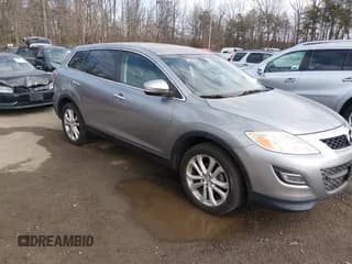 ✅ 2011 Mazda CX-9 Grand Touring • VIN: JM3TB3DVXB0332987 • Lot: 43934305. Listed on IAAI with 180,860 mi. Free auction sales archive from the USA and detailed vehicle history report at DreamBid. Image 1.