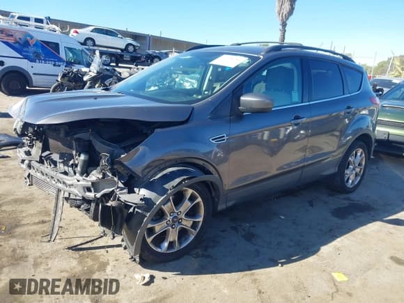 ✅ 2013 Ford Escape SE • VIN: 1FMCU9G97DUD10571 • Lot: 43798281. Listed on IAAI with 156,022 mi. Free auction sales archive from the USA and detailed vehicle history report at DreamBid. Image 17.