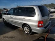 ✅ 2005 Kia Sedona LX • VIN: KNDUP132356769452 • Lot: 82835494. Wystawiony na Copart z przebiegiem 93 845 mil. Bezpłatny archiwum sprzedaży aukcyjnych z USA i szczegółowy raport historii pojazdu na DreamBid. Zdjęcie 2.