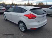✅ 2015 Ford Focus Titanium • VIN: 1FADP3N2XFL211275 • Lot: 43659891. Wystawiony na IAAI z przebiegiem 147 389 mil. Bezpłatny archiwum sprzedaży aukcyjnych z USA i szczegółowy raport historii pojazdu na DreamBid. Zdjęcie 3.
