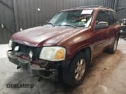 ✅ 2002 GMC Envoy SLT • VIN: 1GKDT13SX22426320 • Lot: 41709359. Listed on IAAI with 104,418 mi. Free auction sales archive from the USA and detailed vehicle history report at DreamBid. Image 2.