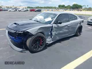 2020 Dodge Charger Scat Pack with VIN 2C3CDXGJ8LH221455, listed as a IAAI auction lot 42885847 with 64,813 mi miles and . Bid and sale history available at DreamBid. Image 2.