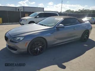 ✅ 2012 BMW 6 Series 650i • VIN: WBALZ3C54CDL71376 • Lot: 82708335. Wystawiony na Copart z przebiegiem 87 675 mil. Bezpłatny archiwum sprzedaży aukcyjnych z USA i szczegółowy raport historii pojazdu na DreamBid. Zdjęcie 1.