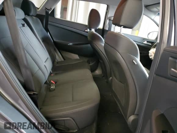 2019 Hyundai Tucson SE z VIN KM8J23A47KU000313, wystawiony jako Copart lot #90115815 z przebiegiem 99 228 mil mil oraz Czysty tytuł • Clean title. Historia ofert i sprzedaży dostępna na DreamBid. Obrazek 11.