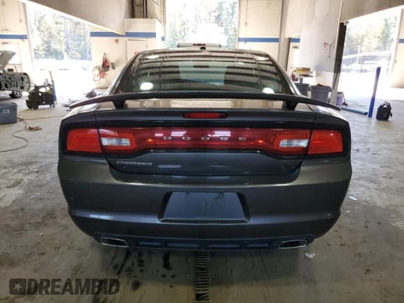 ✅ 2014 Dodge Charger SE • VIN: 2C3CDXBG4EH281103 • Lot: 90240935. Wystawiony na Copart z przebiegiem 172 351 mil. Bezpłatny archiwum sprzedaży aukcyjnych z USA i szczegółowy raport historii pojazdu na DreamBid. Zdjęcie 6.
