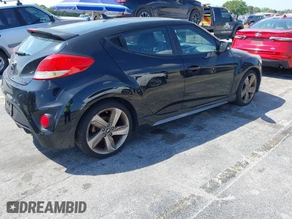 ✅ 2014 Hyundai Veloster Turbo • VIN: KMHTC6AE2EU184967 • Lot: 41780186. Wystawiony na IAAI z przebiegiem 104 822 mil. Bezpłatny archiwum sprzedaży aukcyjnych z USA i szczegółowy raport historii pojazdu na DreamBid. Zdjęcie 4.