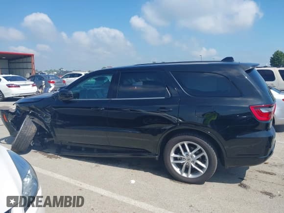 ✅ 2023 Dodge Durango GT Plus • VIN: 1C4RDJDG2PC555615 • Lot: 42674919. Listed on IAAI with 66,751 mi. Free auction sales archive from the USA and detailed vehicle history report at DreamBid. Image 14.