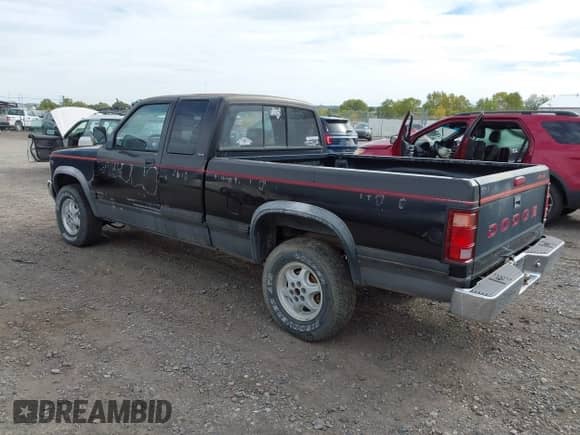 1994 Dodge Dakota with VIN 1B7GG23X9RS562415, listed as a IAAI auction lot 43365648 with 157,671 mi miles and . Bid and sale history available at DreamBid. Image 3.