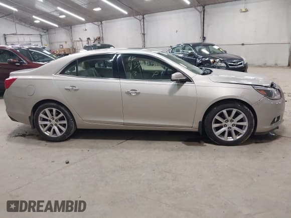 ✅ 2013 Chevrolet Malibu LTZ • VIN: 1G11H5SA5DF179700 • Lot: 43591171. Listed on IAAI with 148,979 mi. Free auction sales archive from the USA and detailed vehicle history report at DreamBid. Image 12.