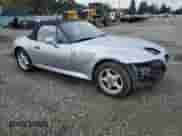 1997 BMW 3 Series Z3 1.9 with VIN 4USCH7325VLB80686, listed as a Copart auction lot 90709565 with 127,908 mi miles and Salvage title. Bid and sale history available at DreamBid. Image 4.