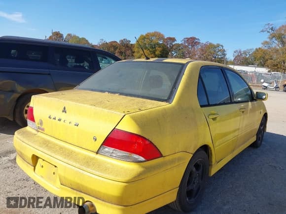 ✅ 2002 Mitsubishi Lancer OZ-Rally • VIN: JA3AJ86E72U062749 • Lot: 43702812. Listed on IAAI with 192,706 mi. Free auction sales archive from the USA and detailed vehicle history report at DreamBid. Image 4.