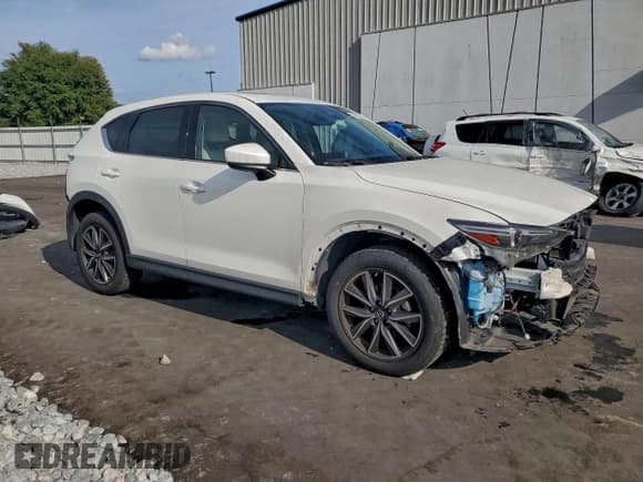 ✅ 2018 Mazda CX-5 Grand Touring • VIN: JM3KFBDM8J0310082 • Lot: 94713205. Listed on Copart with 70,962 mi. Free auction sales archive from the USA and detailed vehicle history report at DreamBid. Image 4.