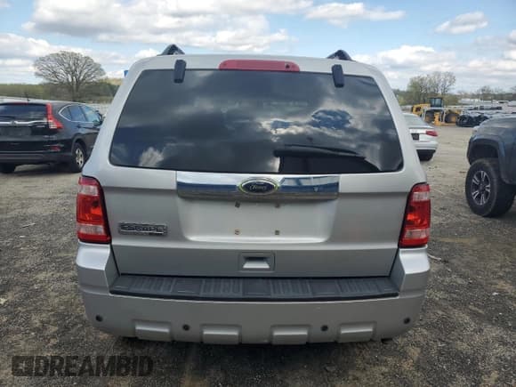 ✅ 2009 Ford Escape Limited • VIN: 1FMCU04779KC31564 • Lot: 55503635. Listed on Copart with 106,445 mi. Free auction sales archive from the USA and detailed vehicle history report at DreamBid. Image 6.