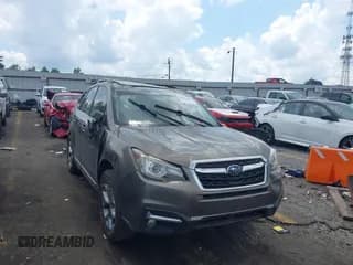 ✅ 2017 Subaru Forester Touring • VIN: JF2SJATC7HH523709 • Lot: 42147986. Listed on IAAI with 146,807 mi. Free auction sales archive from the USA and detailed vehicle history report at DreamBid. Image 1.