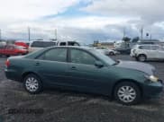 ✅ 2005 Toyota Camry STD • VIN: JTDBE32K350317126 • Lot: 43623503. Listed on IAAI with 291,098 mi. Free auction sales archive from the USA and detailed vehicle history report at DreamBid. Image 13.