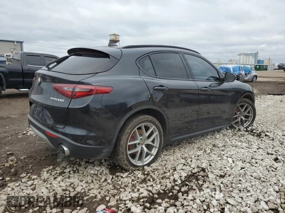 ✅ 2018 Alfa Romeo Stelvio Ti Sport • VIN: ZASFAKNN2J7B87197 • Lot: 85889645. Listed on Copart with 105,549 mi. Free auction sales archive from the USA and detailed vehicle history report at DreamBid. Image 3.