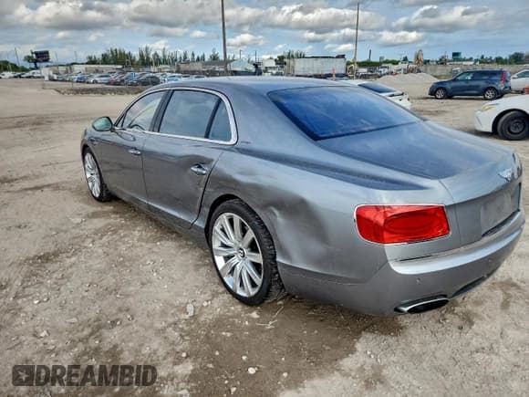 ✅ 2014 Bentley Flying Spur • VIN: SCBEC9ZAXEC088187 • Lot: 95693445. Wystawiony na Copart z przebiegiem 47 445 mil. Bezpłatny archiwum sprzedaży aukcyjnych z USA i szczegółowy raport historii pojazdu na DreamBid. Zdjęcie 2.