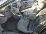 ✅ 2001 Ford Mustang Deluxe • VIN: 1FAFP44431F130921 • Lot: 91164215. Listed on Copart with 105,073 mi. Free auction sales archive from the USA and detailed vehicle history report at DreamBid. Image 7.