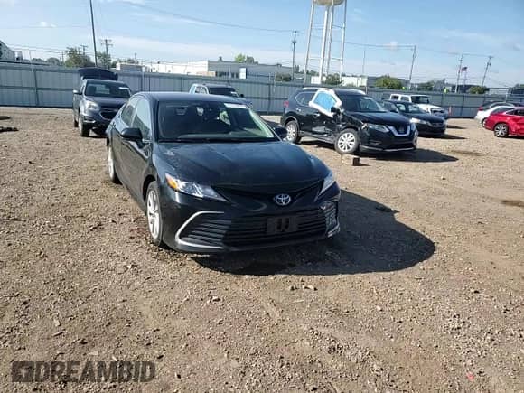 2023 Toyota Camry LE z VIN 4T1C11AK0PU725483, wystawiony jako Copart lot #71720255 z przebiegiem 76 231 mil mil oraz Szkoda całkowita • Salvage title. Historia ofert i sprzedaży dostępna na DreamBid. Obrazek 13.