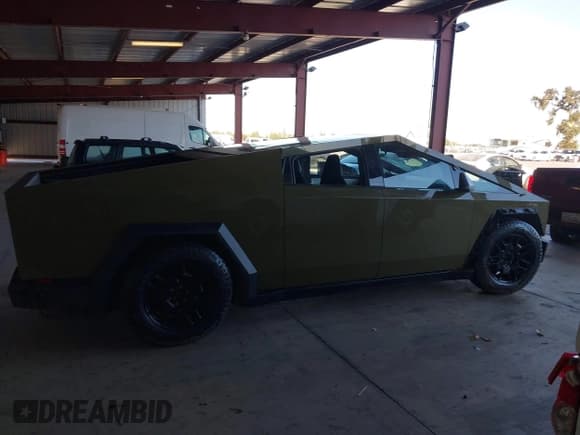 ✅ 2024 Tesla Cybertruck • VIN: 7G2CEHED0RA006320 • Lot: 42956257. Listed on IAAI with 28,757 mi. Free auction sales archive from the USA and detailed vehicle history report at DreamBid. Image 14.