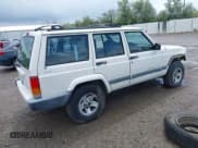 ✅ 1999 Jeep Cherokee Sport • VIN: 1J4FF68S4XL651250 • Lot: 42370723. Listed on IAAI with 203,728 mi. Free auction sales archive from the USA and detailed vehicle history report at DreamBid. Image 4.