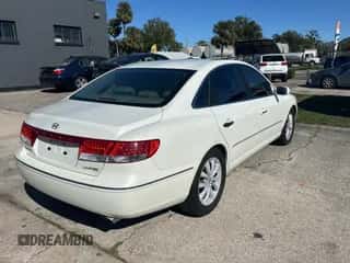 2006 Hyundai Azera SE z VIN KMHFC46F06A115488, wystawiony jako Copart lot #82186884 z przebiegiem 159 676 mil mil oraz Czysty tytuł • Clean title. Historia ofert i sprzedaży dostępna na DreamBid. Obrazek 4.