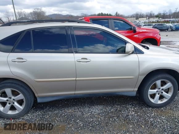 ✅ 2007 Lexus RX 350 • VIN: 2T2GK31UX7C010705 • Lot: 41731795. Listed on IAAI with 242,456 mi. Free auction sales archive from the USA and detailed vehicle history report at DreamBid. Image 13.