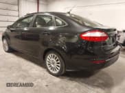 ✅ 2014 Ford Fiesta Titanium • VIN: 3FADP4CJ8EM131230 • Lot: 43712533. Wystawiony na IAAI z przebiegiem 105 396 mil. Bezpłatny archiwum sprzedaży aukcyjnych z USA i szczegółowy raport historii pojazdu na DreamBid. Zdjęcie 3.