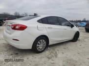 ✅ 2017 Chevrolet Cruze LS • VIN: 1G1BC5SM0H7174143 • Lot: 40271703. Listed on Copart with 59,329 mi. Free auction sales archive from the USA and detailed vehicle history report at DreamBid. Image 3.