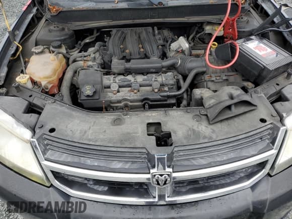 ✅ 2008 Dodge Avenger SXT • VIN: 1B3LC56R18N100227 • Лот: 79960514. Опубликован ранее на Copart с пробегом 195 917 миль. Бесплатный доступ к архиву аукционных продаж из США и подробный отчёт об истории автомобиля на DreamBid. Изображение 11.