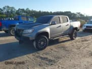 ✅ 2022 Chevrolet Colorado 4WD ZR2 • VIN: 1GCGTEEN0N1305930 • Лот: 41823662. Опубликован ранее на IAAI с пробегом 25 431 миль. Бесплатный доступ к архиву аукционных продаж из США и подробный отчёт об истории автомобиля на DreamBid. Изображение 2.