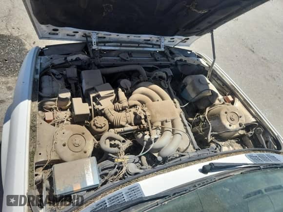 1991 BMW 3 Series z VIN WBABB2314MEC26165, wystawiony jako Copart lot #58839205 z przebiegiem 124 898 mil mil oraz Szkoda całkowita • Salvage title. Historia ofert i sprzedaży dostępna na DreamBid. Obrazek 11.