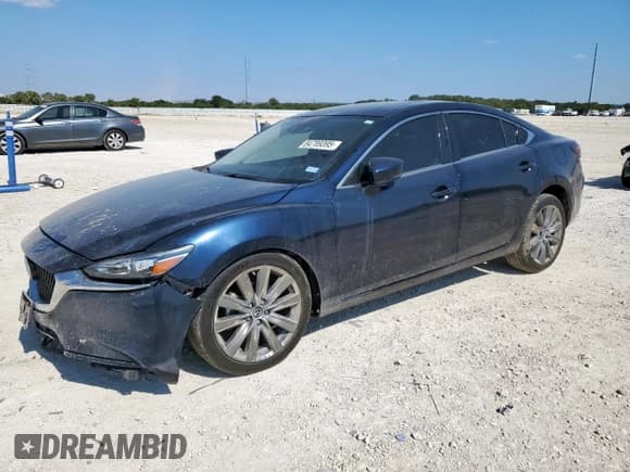 ✅ 2021 Mazda 6 Touring • VIN: JM1GL1VM5M1618471 • Лот: 84789395. Опубликован ранее на Copart с пробегом 31 566 миль. Бесплатный доступ к архиву аукционных продаж из США и подробный отчёт об истории автомобиля на DreamBid. Изображение 1.