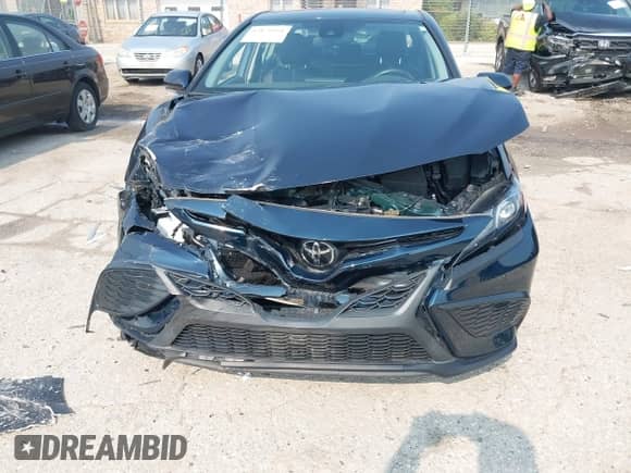 2021 Toyota Camry SE with VIN 4T1T11BKXMU042040, listed as a IAAI auction lot 42879951 with 35,130 mi miles and . Bid and sale history available at DreamBid. Image 6.