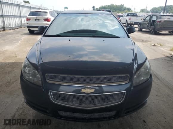 ✅ 2011 Chevrolet Malibu 1LS • VIN: 1G1ZB5E11BF173227 • Lot: 66145054. Listed on Copart with 123,244 mi. Free auction sales archive from the USA and detailed vehicle history report at DreamBid. Image 5.
